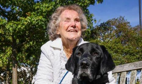 A picture of Jill Allen-King with her guide dog